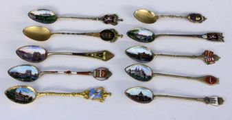 A LOT OF 10 SOUVENIR SPOONS Silver, partly gilt, mostly with enamelled views and coat of