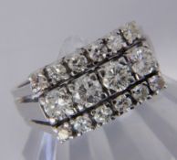 A HIGH QUALITY BRILLIANT CUT DIAMONDS RING 585/000 white gold. 16 brilliant cut diamonds