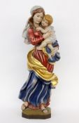 MADONNA AND CHILD Alpine, 20th century Wooden sculpture, carved and painted in colour. 94