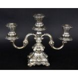 A CANDLESTICK Hans Jensen, Copenhagen circa 1900 Silver. 3-light candlestick in Baroque