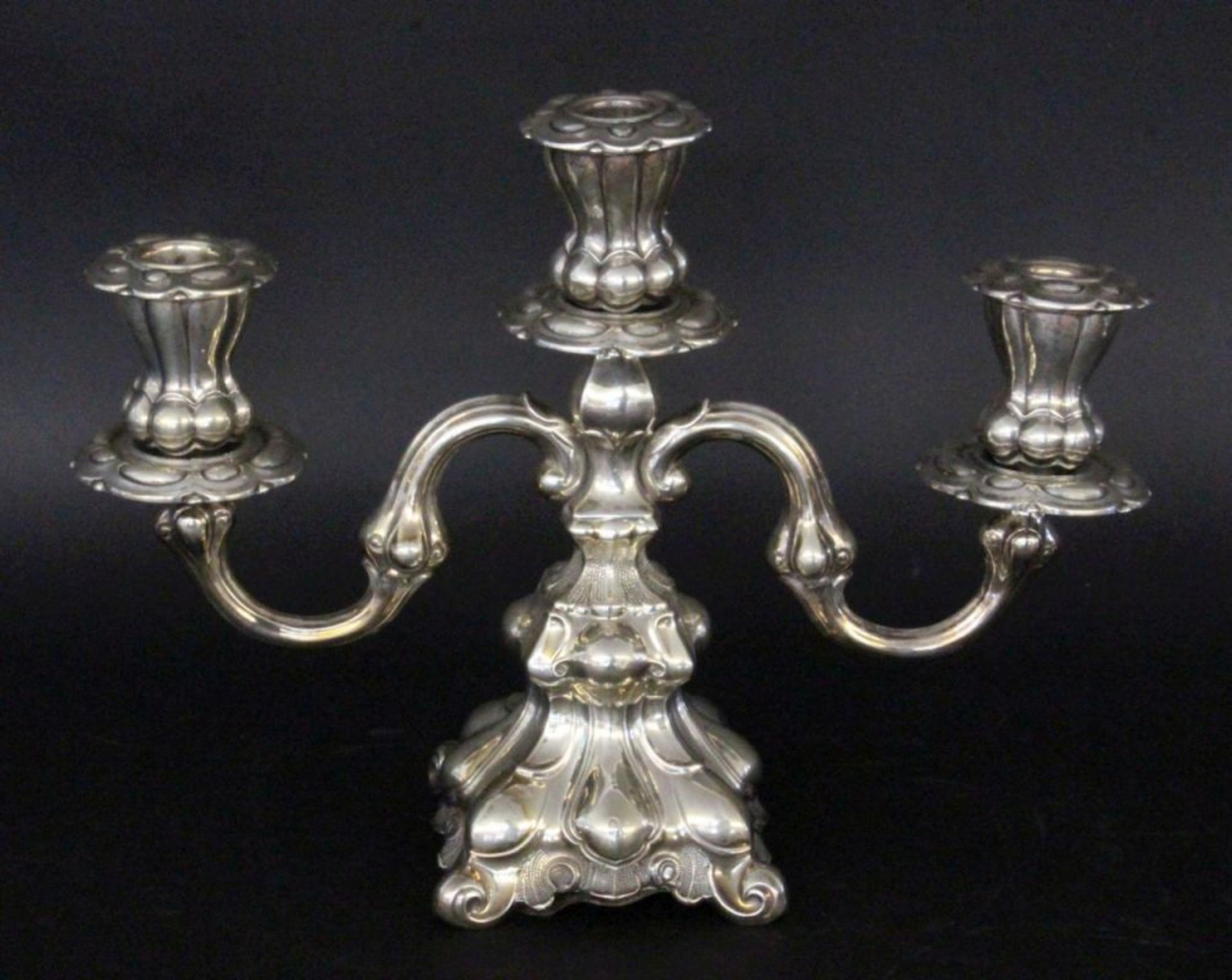 A CANDLESTICK Hans Jensen, Copenhagen circa 1900 Silver. 3-light candlestick in Baroque