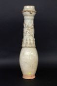 A VASE China, probably Yuan dynasty 1206-1368 Slim cone shape with figural reliefdecoration (Ying