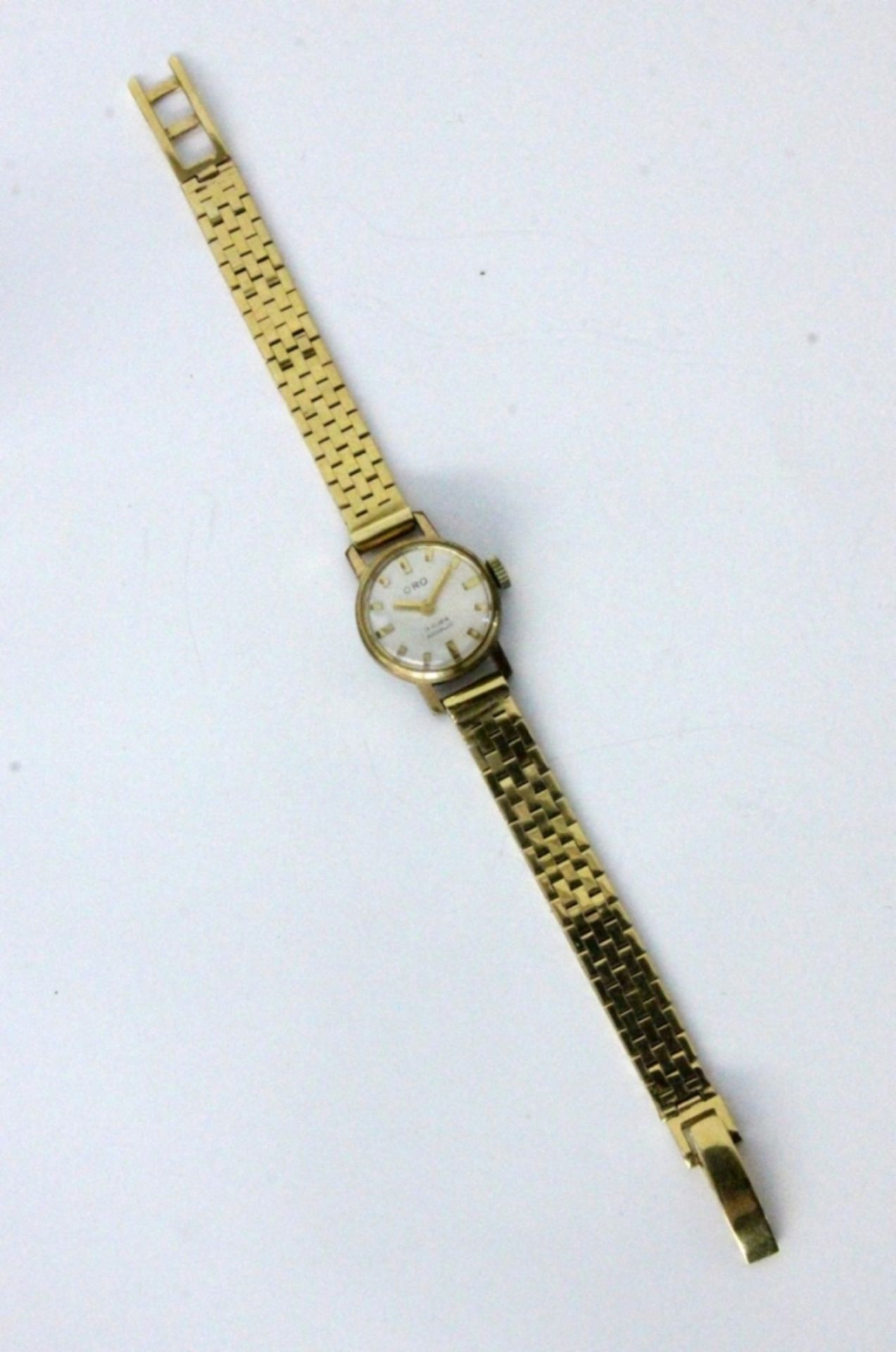 ORO DAMENARMBANDUHRBand 750/000 Gelbgold. Gehäuse Doublé. Incabloc, Handaufzug. L.15,5cm, Brutto ca.