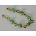 ARMBANDSilber vergoldet mit Amazoniten. L.17cmA BRACELET Silver, gold-plated with amazonites. 17