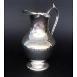 SCHENKKANNEVersilbertes Metall. H.23,5cmA JUG Silver-plated metal. 23.5 cm high. Keywords: pot, can,