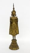 STEHENDER BUDDHAThailand, 19.Jh. Bronze vergoldet. H.58cm. Goldabrieb.A STANDING BUDDHA Thailand,