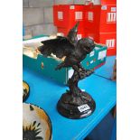 BRONZE PATINATED SCULPTURE OF AN OWL ON A BRANCH, ON CIRCULAR MARBLE PLINTH, 30CM HIGH