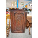 LATE 18THC OAK FLAT FRONT WALL HANGING CORNER CABINET, SINGLE DOOR, LATER CARVED, 117CM HIGH