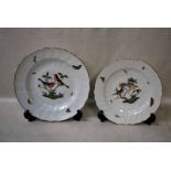 A set of six Herend Hungarian porcelain plates, hand painted with hedgerow birds and insects, 25.5cm