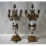 A pair of early 20th century French Empire style Candelabrum, gilt metal and white veined marble,