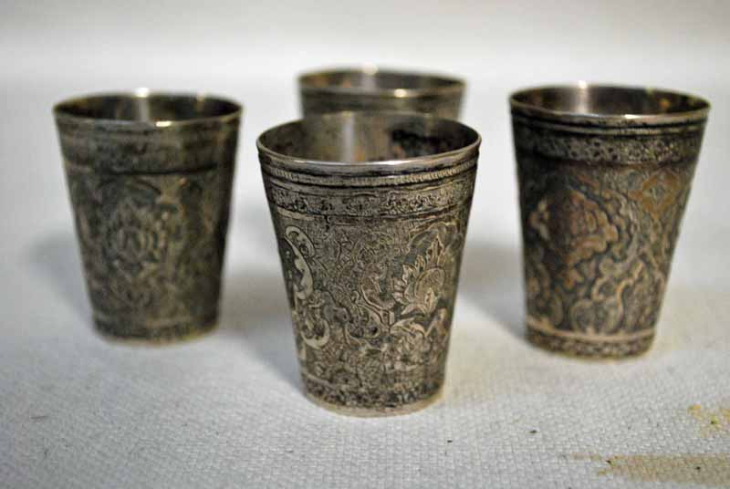 A set of four early 20th century Russian silver Toasting Cups or Spirit Measures, circular