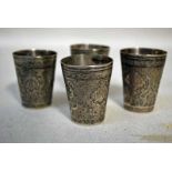 A set of four early 20th century Russian silver Toasting Cups or Spirit Measures, circular