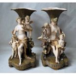 A pair of late 19th century Austrian figural Vases by Ernst Wahliss Turn Wien, modelled in a