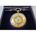 A late 19th century 18ct gold open face Pocket Watch, gilt face with beaded edge, Roman numerals and