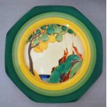 A Clarice Cliff Newport Pottery Octagonal Plate, hand painted in the Secrets design depicting a