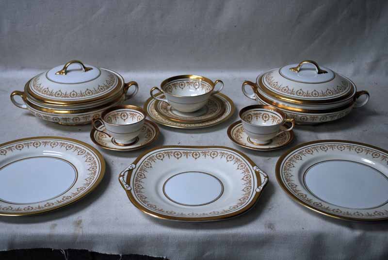 An extensive Aynsley Bone China Dinner and Tea Service, Gold Dowery pattern, gilt on ivory, number