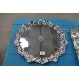 LARGE HEAVY FOOTED SERVING TRAY, SHAPED CIRCULAR WITH SCROLLING RAISED RIM, MONOGRAMMED, 47CM