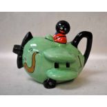 A rare Carlton ware Novelty Teapot, in the form of an Aeroplane being flown by a Black Boy, jade gre