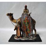 After Franz Bergmann, a cold painted Spelter Table Lighter modelled as two Middle Eastern Rug