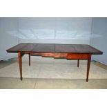 A George III mahogany extending Dining table in the form of a Pembroke Table, telescopic
