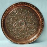 A Keswick School of Industrial Arts copper Large Tray, circular embossed with organic and foliate