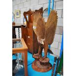 LARGE CARVED WOOD MODEL OF A GOLDEN EAGLE 83CM HIGH