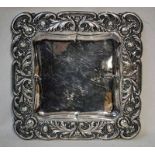 A good quality Britannia silver Tray, 958 standard, square form with heavily embossed shaped and