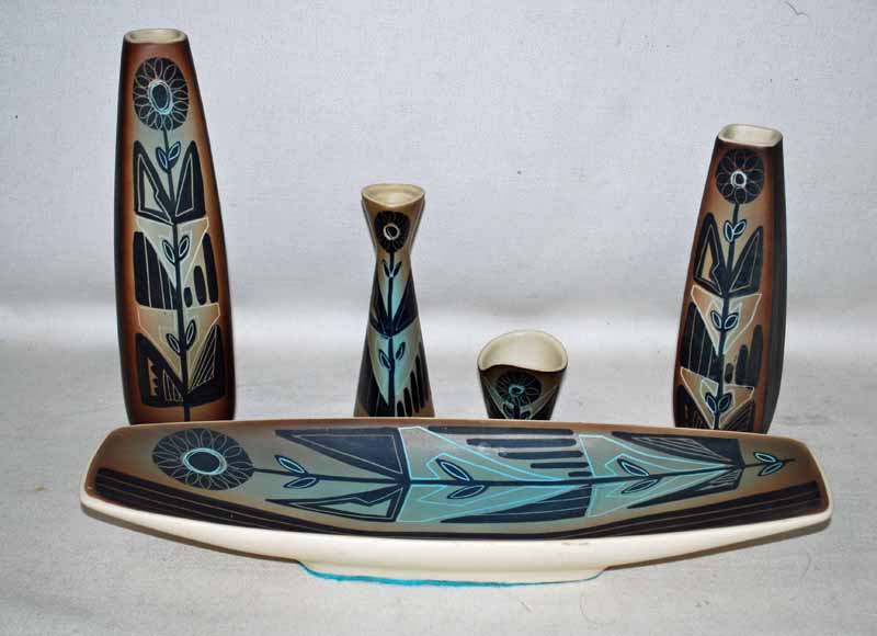 Danish Stoneware: a small suite of Holm Sorensen pottery including a boat shape rectangular bowl