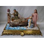 A large 20th century Capo di Monte Figural Group entitled La Pesca Miracolosa, depicting Jesus