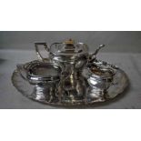 A good Walker and Hall silver plated three-piece Tea Service on an oval scallop edge tray (4)