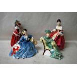 Four Royal Doulton Figurines: HN2229 Southern Belle, HN1992 Christmas Morn, HN2429 Elyse and