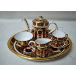 A Royal Crown Derby six-piece Child's Tea for One, Imari 1128 pattern including, Tea Pot, Tea Cup