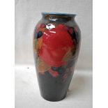 William Moorcroft, a tubeline decorated pottery Baluster Vase in the Pomegranate design, 20cm high