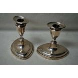 A pair of short Edwardian Silver Candlesticks, Adam style oval form, removable drip tray, urnular