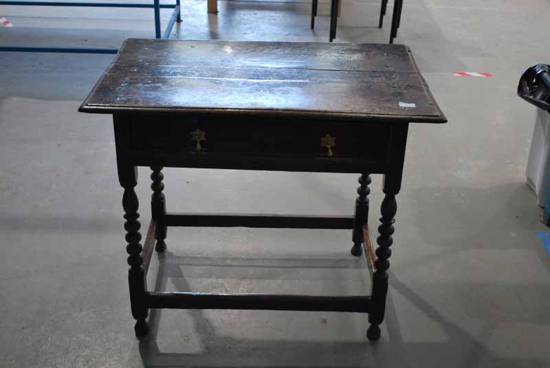 An 18th century oak Side Table, three plank rectangular top with moulded edge to three sides, single