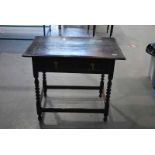 An 18th century oak Side Table, three plank rectangular top with moulded edge to three sides, single