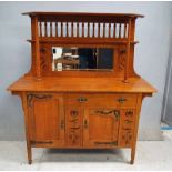 A good quality early 20th century Arts and Crafts oak Mirrored Back Sideboard, possibly by Maple &