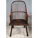 A 19th century Ash and Elm Stick Back Windsor Chair, hooped back and arms, saddle seat on splayed