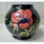 A late 20th century Moorcroft Pottery tubeline decorated Vase of Globe form, in the Anemone