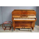 An Art Deco walnut cased six octave Upright Piano by Rogers Eungblut, with matching walnut Stool,