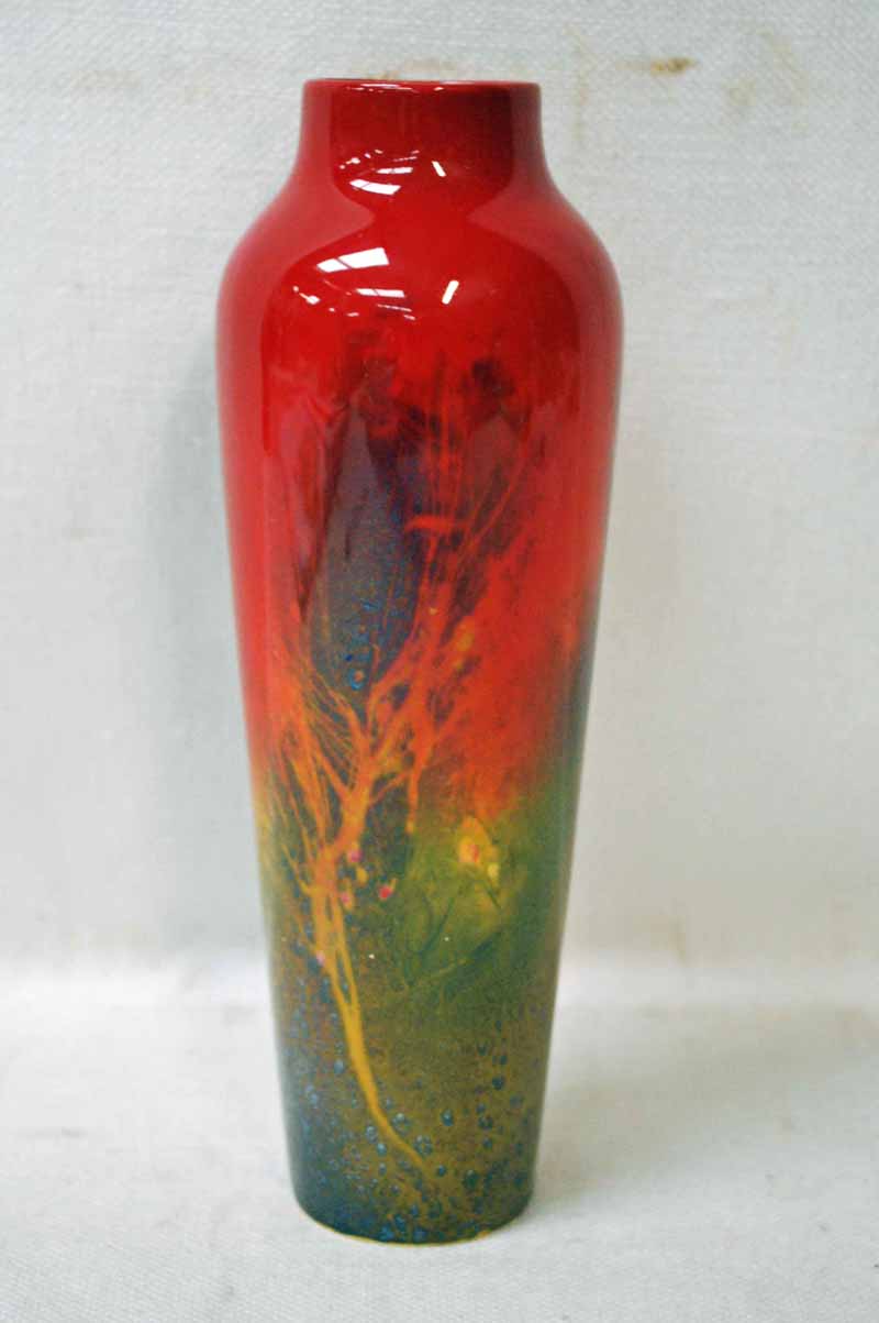 Charles Noke and Fred Moore, a Royal Doulton Sung Flambe Vase of elongated circular baluster form,