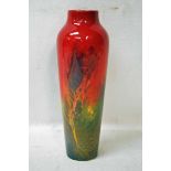 Charles Noke and Fred Moore, a Royal Doulton Sung Flambe Vase of elongated circular baluster form,