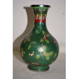 An early 20th century Chinese Cloisonne Vase, bulbous form, white metal mounted rim and foot,