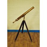 An early 20th century Brass Telescope on a wooden tripod support by Armstrong's of Manchester, 100cm