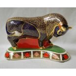 A large Royal Crown Derby Desk Weight as an Imari decorated Bull, silver stopper, 18cm long