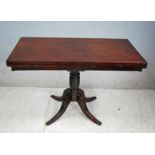 A Georgian mahogany fold over Tea Table, with step carving on central ring turned pedestal, 71cm