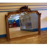 An over mantel or Pier Mirror, late Victorian style, gilt framed bevelled glass, 115cm high by 130cm