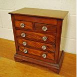 A Victorian miniature Chest of Drawers in mahogany - these little chests are often termed apprentice