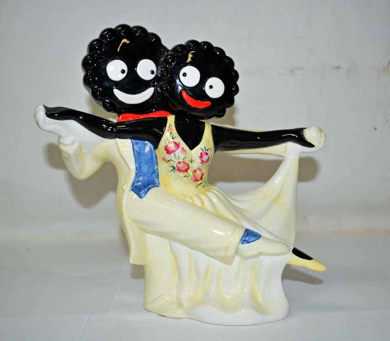 A Carlton Ware novelty Teapot modelled as a Dancing Golly couple, gold backstamp and marked '