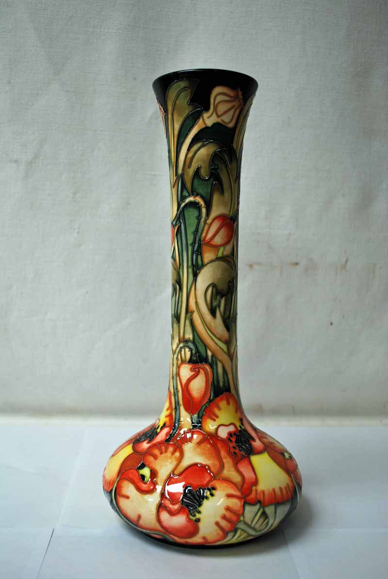 A Moorcroft Vase, onion shape with elongated neck, marked 'DES TRIAL 20-11-03' underneath, signed